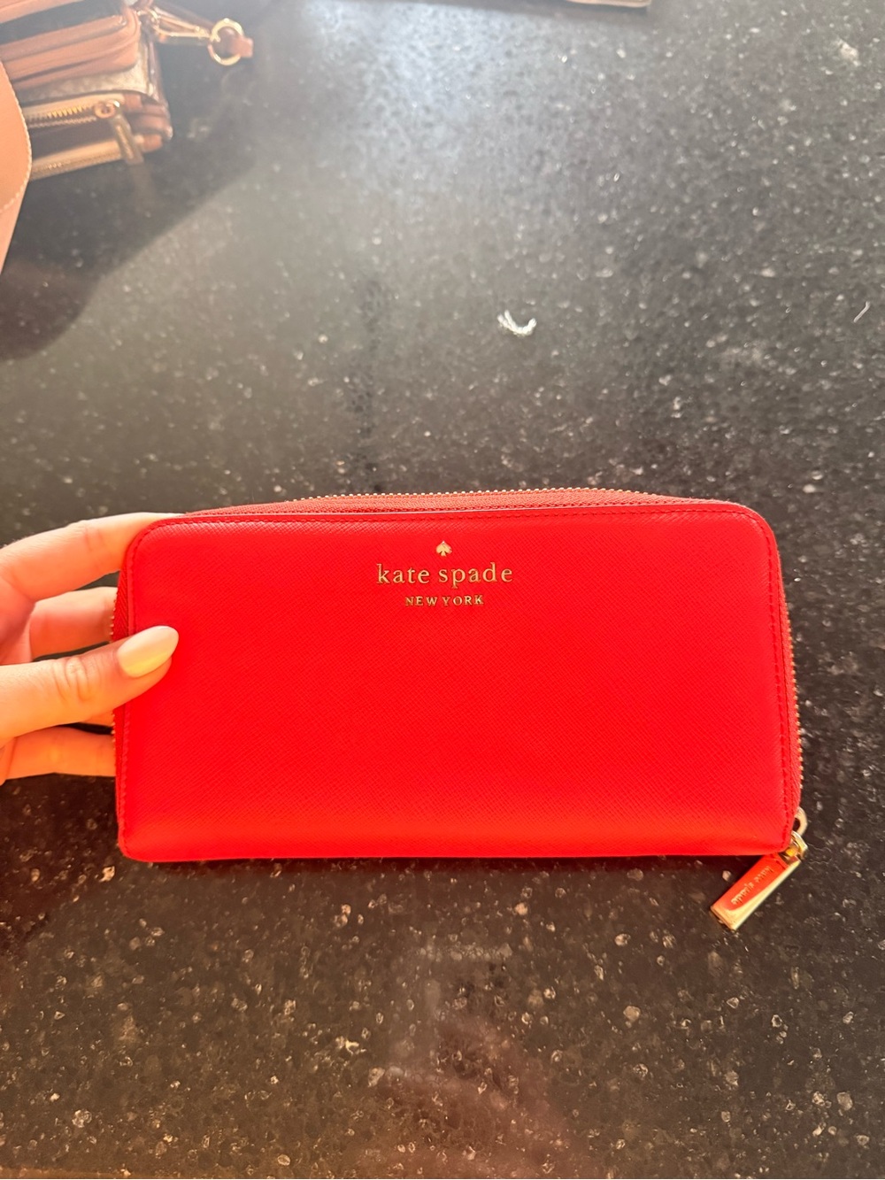 kate spade Red Saffiano Zip-Around Wallet with Gold Logo